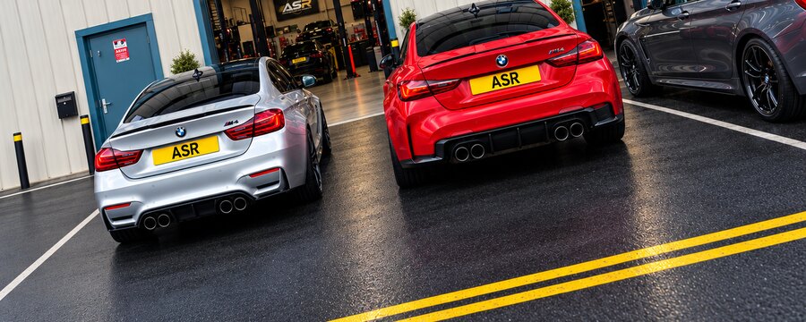 Two ASR-plated BMW M4s outside the ASR workshop in Ramsgate