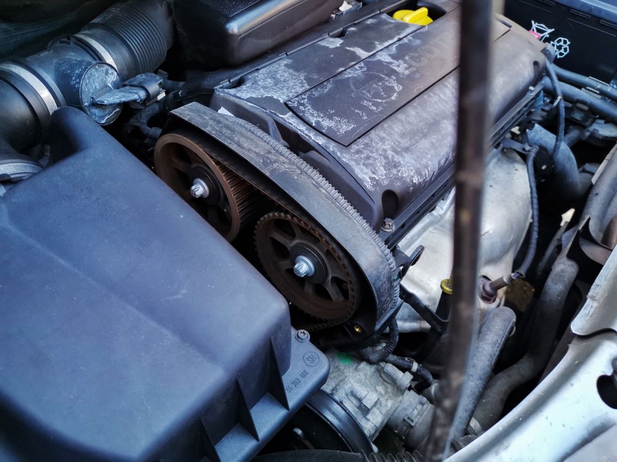 Timing belt and chain replacement at ASR – cam belt and pulleys on an engine with the cover off